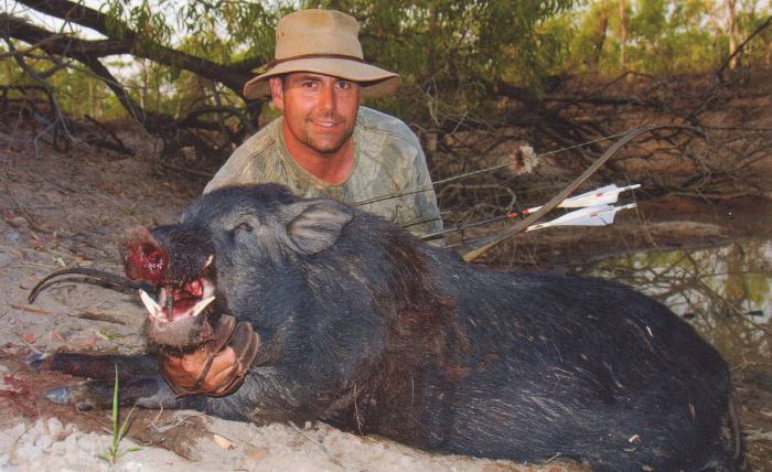 Ben Weatherall with his third boar for the trip - Click for enlargement